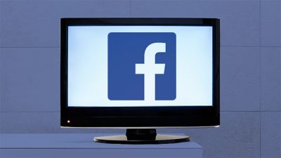 An image of a computer with the logo for Facebook.